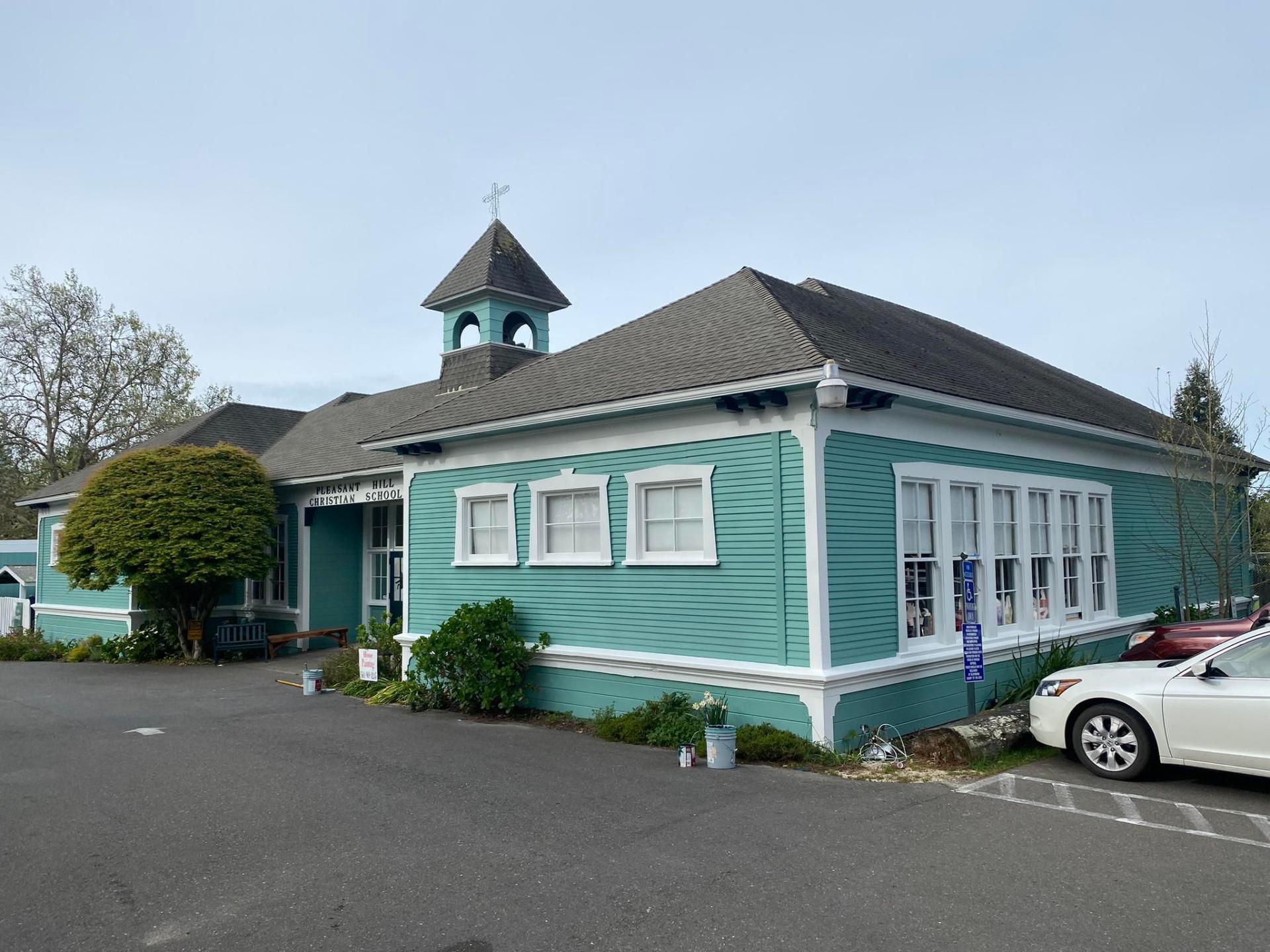 Exterior house painting - teal siding