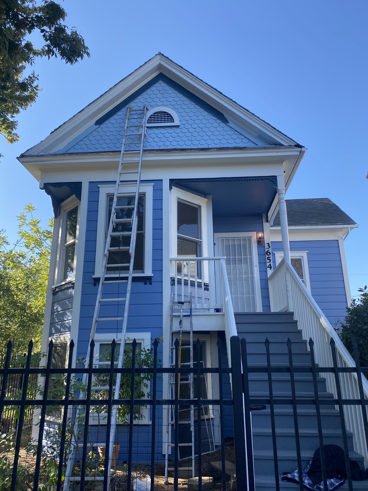 Exterior house painting - blue Victorian